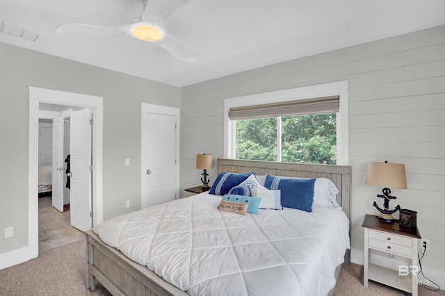 carpeted bedroom featuring ceiling fan