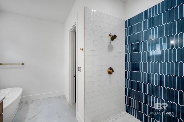 bathroom with a tile shower