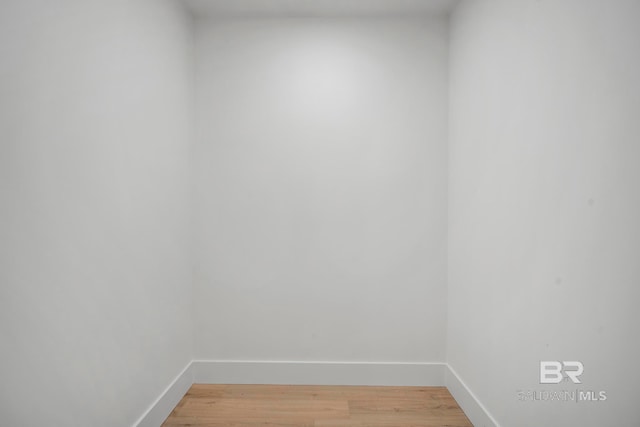 spare room featuring hardwood / wood-style floors