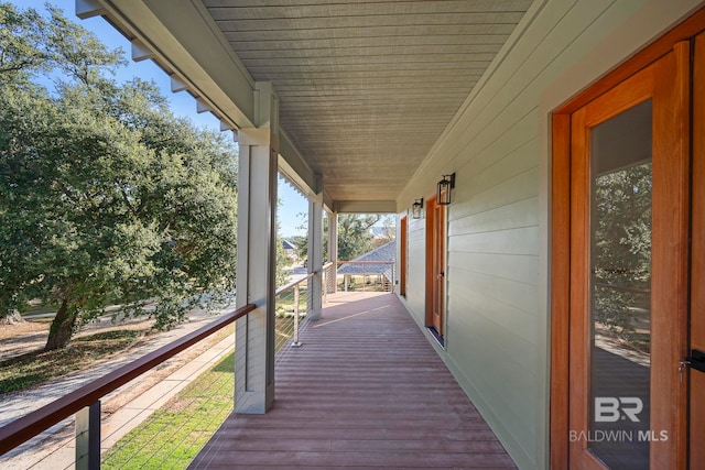 wooden deck featuring a porch