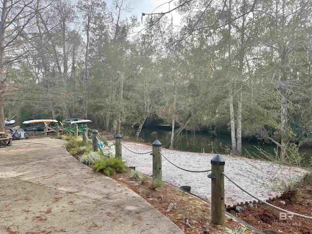 view of yard with a water view