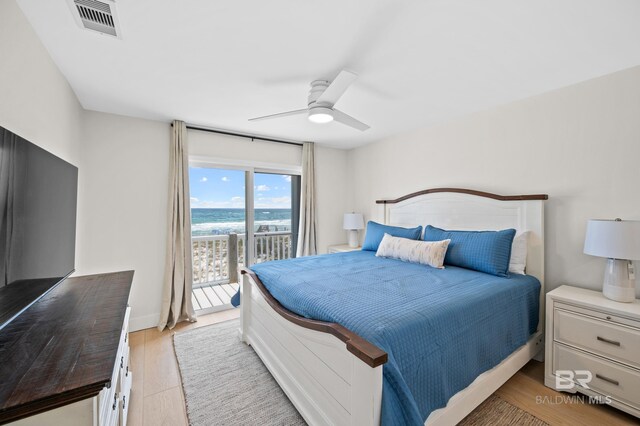 bedroom featuring visible vents, light wood-style flooring, a ceiling fan, access to outside, and baseboards