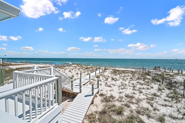 property view of water featuring a beach view