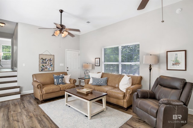 living room featuring ceiling fan, hardwood / wood-style floors, and a healthy amount of sunlight