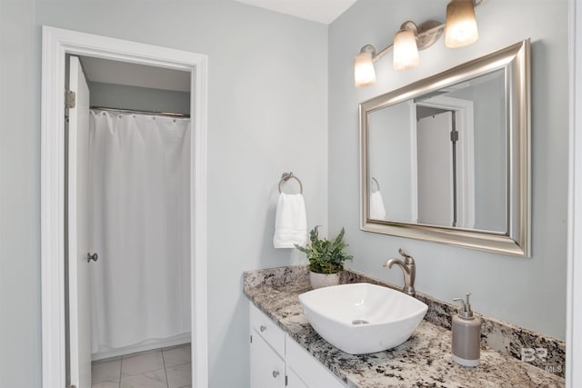 bathroom with vanity and walk in shower