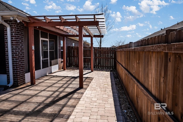 view of patio featuring a fenced backyard and a pergola