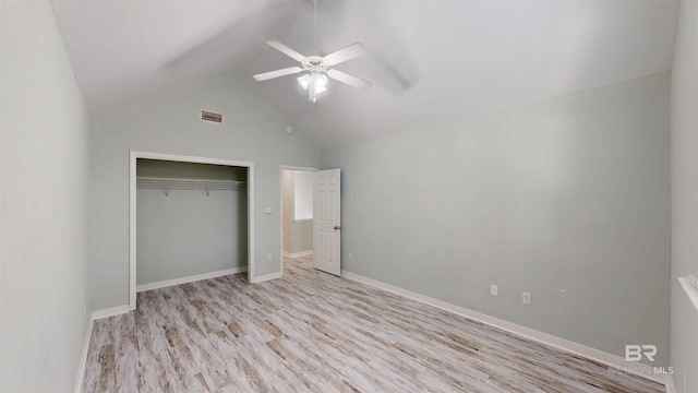 unfurnished bedroom featuring ceiling fan, baseboards, wood finished floors, visible vents, and a closet