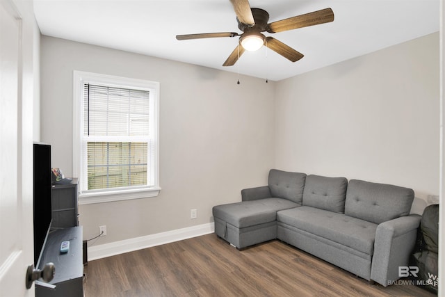 1508 Phillips Ln, Mobile, AL 36618 - living area with wood finished floors, healthy amount of natural light, baseboards, and a ceiling fan