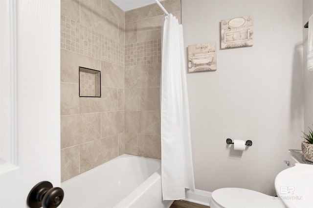 1508 Phillips Ln, Mobile, AL 36618 - bathroom featuring toilet and shower / tub combo with curtain