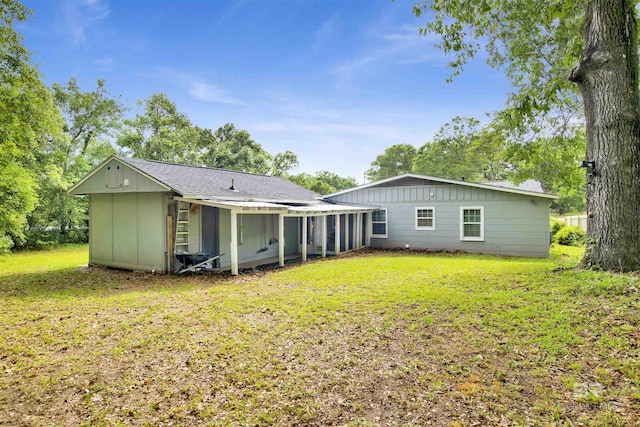 1508 Phillips Ln, Mobile, AL 36618 - rear view of property with a yard and roof with shingles