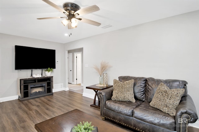 1508 Phillips Ln, Mobile, AL 36618 - living area with baseboards, ceiling fan, and wood finished floors