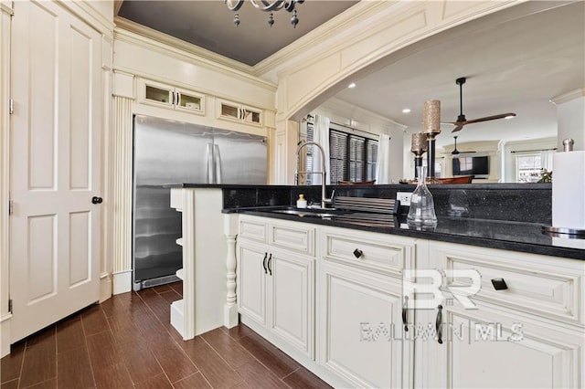 bathroom with ceiling fan, ornamental molding, toilet, and vanity