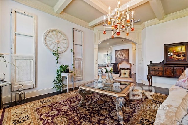 living room featuring coffered ceiling, a notable chandelier, wood-type flooring, ornamental molding, and beamed ceiling