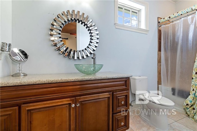 full bathroom featuring tile patterned flooring, vanity, shower / bath combination with curtain, and toilet