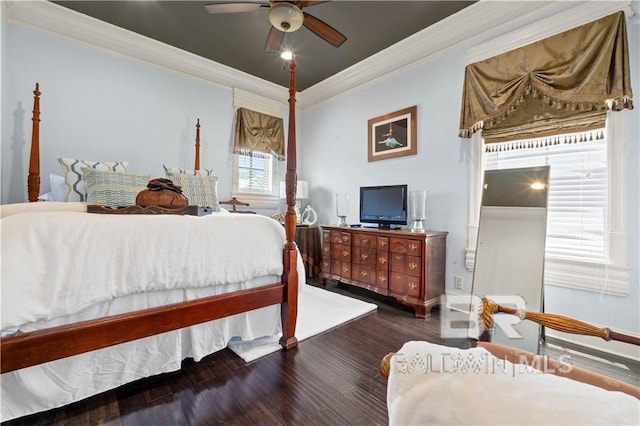 bedroom featuring dark wood-type flooring, ceiling fan, and crown molding