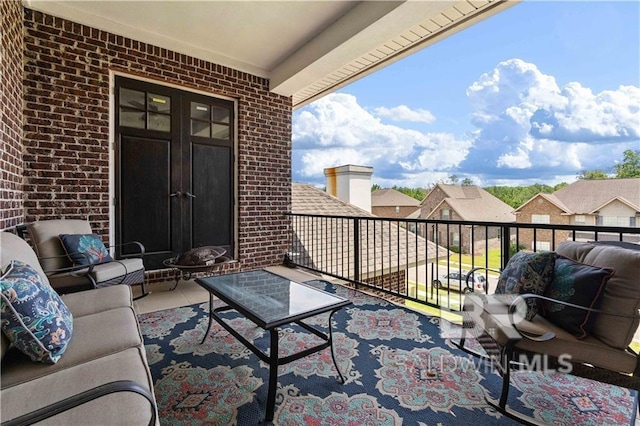 balcony with an outdoor hangout area