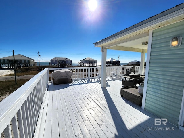 deck featuring a grill