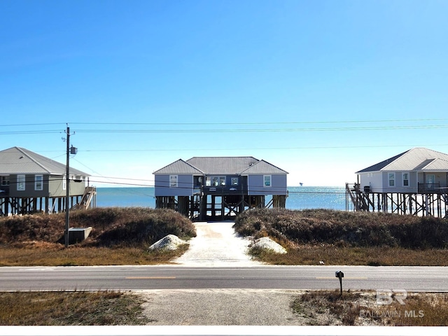 exterior space with a water view