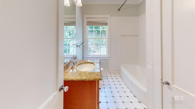 full bathroom with vanity, crown molding, tub / shower combination, and tile patterned floors