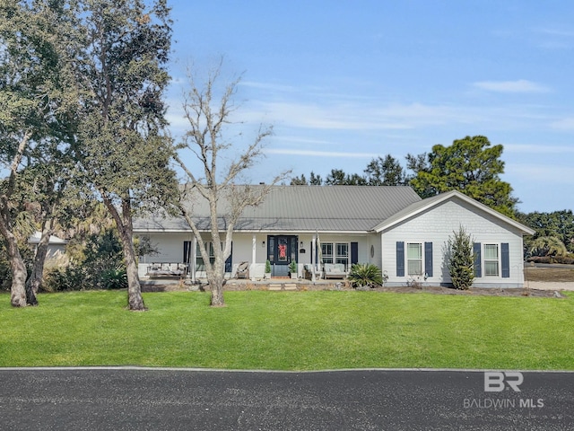 ranch-style home with a front lawn