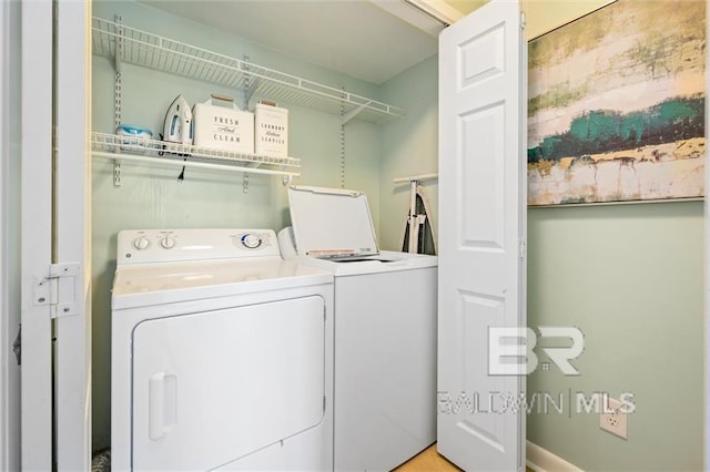 laundry room with laundry area and separate washer and dryer