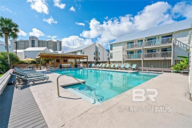 community pool featuring a patio