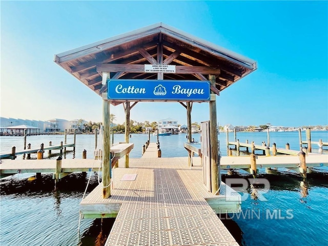 dock area featuring a water view