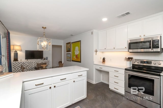 6000 Shenandoah Rd, Mobile, AL 36608 - kitchen featuring stainless steel appliances, light countertops, white cabinets, a peninsula, and recessed lighting