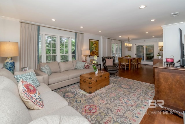 6000 Shenandoah Rd, Mobile, AL 36608 - living area with wood finished floors, ornamental molding, and recessed lighting