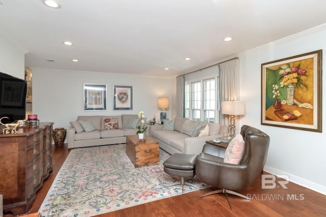 6000 Shenandoah Rd, Mobile, AL 36608 - living area with wood finished floors, recessed lighting, crown molding, and baseboards