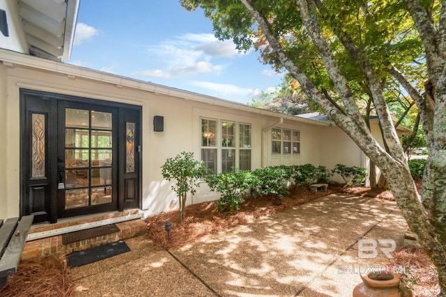 6000 Shenandoah Rd, Mobile, AL 36608 - doorway to property featuring stucco siding