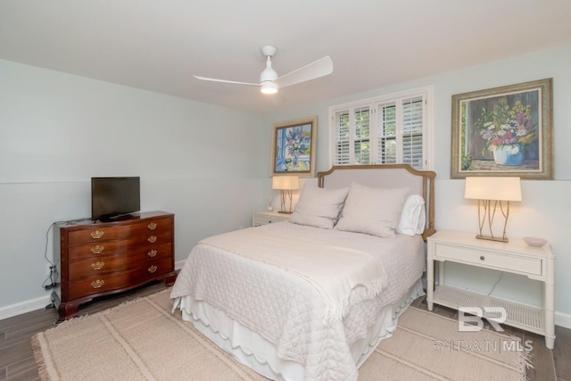 6000 Shenandoah Rd, Mobile, AL 36608 - bedroom with wood finished floors, baseboards, and a ceiling fan