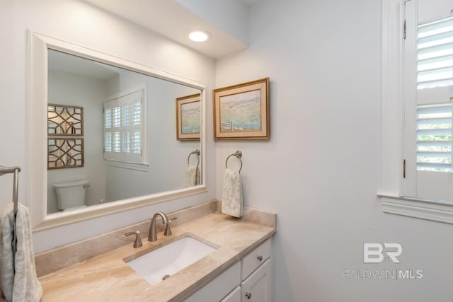 6000 Shenandoah Rd, Mobile, AL 36608 - half bath featuring toilet, healthy amount of natural light, and vanity