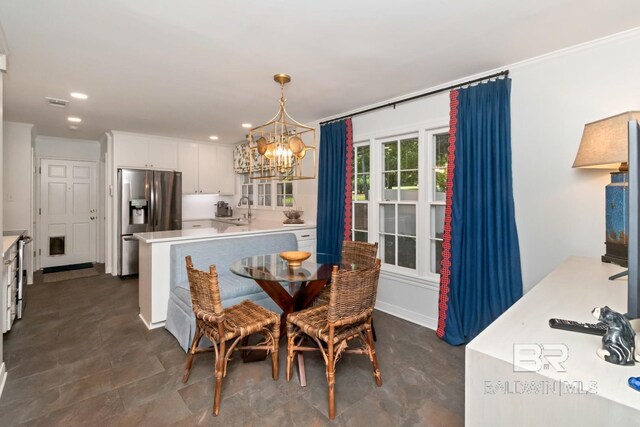 6000 Shenandoah Rd, Mobile, AL 36608 - dining space featuring a chandelier, recessed lighting, and ornamental molding