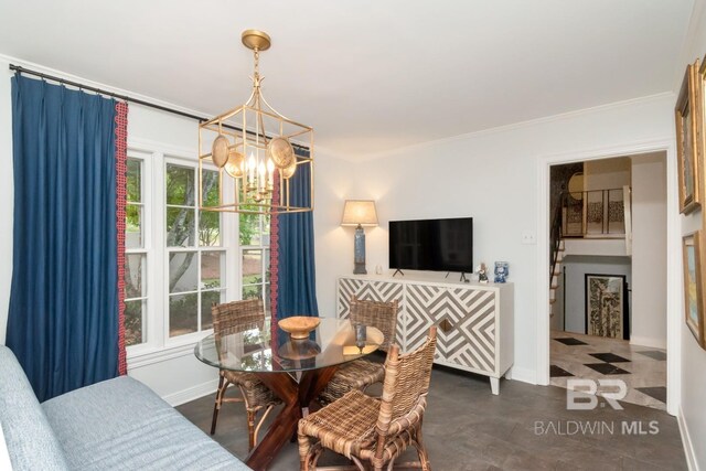 6000 Shenandoah Rd, Mobile, AL 36608 - dining room with a chandelier, ornamental molding, and baseboards