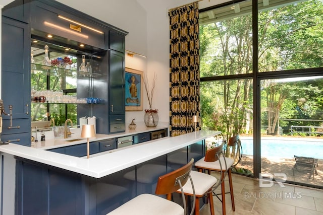6000 Shenandoah Rd, Mobile, AL 36608 - bar featuring a sink and plenty of natural light