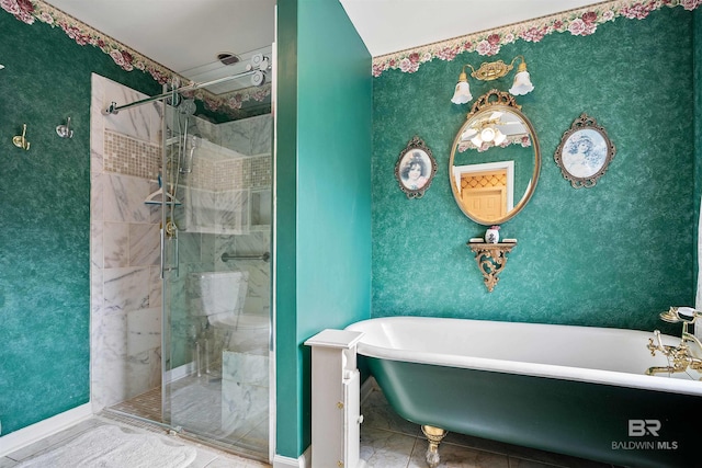 bathroom featuring tile patterned flooring and independent shower and bath