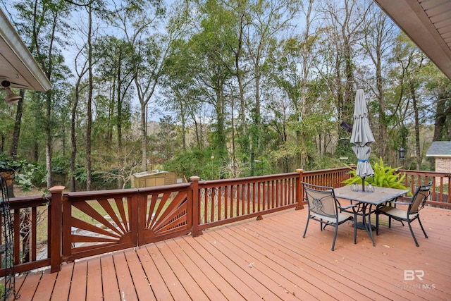 deck featuring a shed