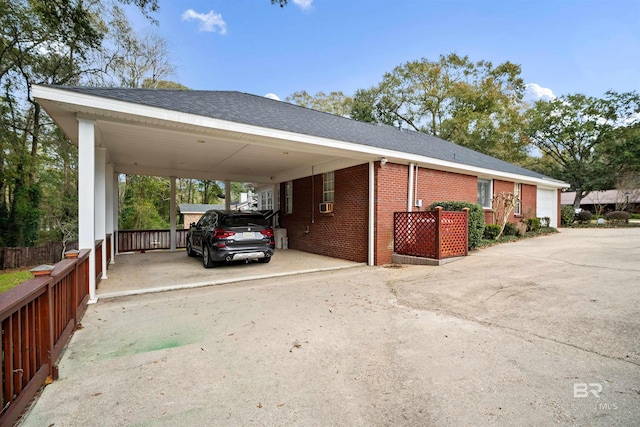 view of car parking featuring a carport