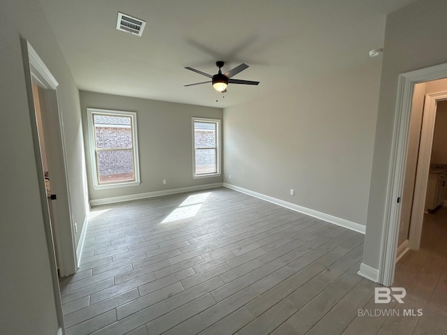 unfurnished bedroom with ceiling fan and light hardwood / wood-style flooring