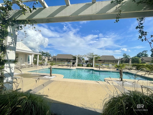 1556 Kairos Loop, Foley, AL 36535 - community pool with a patio