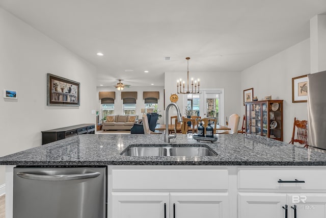1556 Kairos Loop, Foley, AL 36535 - kitchen featuring dishwasher, white cabinetry, a ceiling fan, dark stone countertops, and recessed lighting