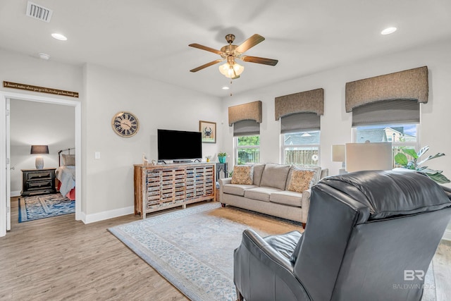 1556 Kairos Loop, Foley, AL 36535 - living room with light wood-style flooring, healthy amount of natural light, a ceiling fan, and recessed lighting