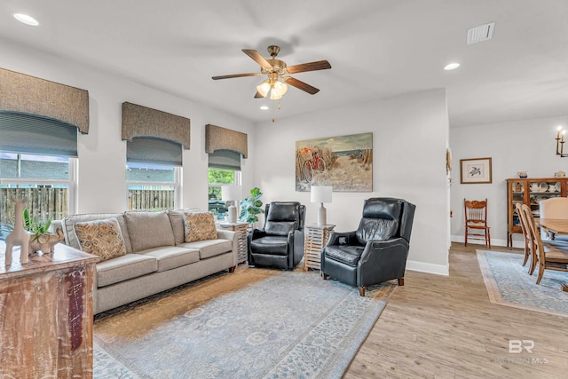 1556 Kairos Loop, Foley, AL 36535 - living area featuring ceiling fan, recessed lighting, and light wood finished floors