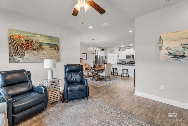 1556 Kairos Loop, Foley, AL 36535 - living room with a ceiling fan, recessed lighting, a chandelier, and wood finished floors
