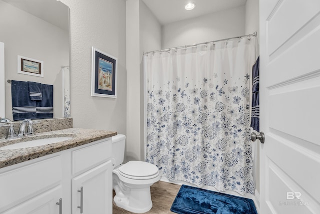 1556 Kairos Loop, Foley, AL 36535 - full bath with vanity, wood finished floors, and a shower with shower curtain