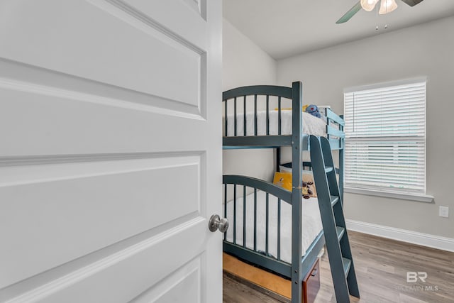1556 Kairos Loop, Foley, AL 36535 - bedroom featuring wood finished floors and ceiling fan