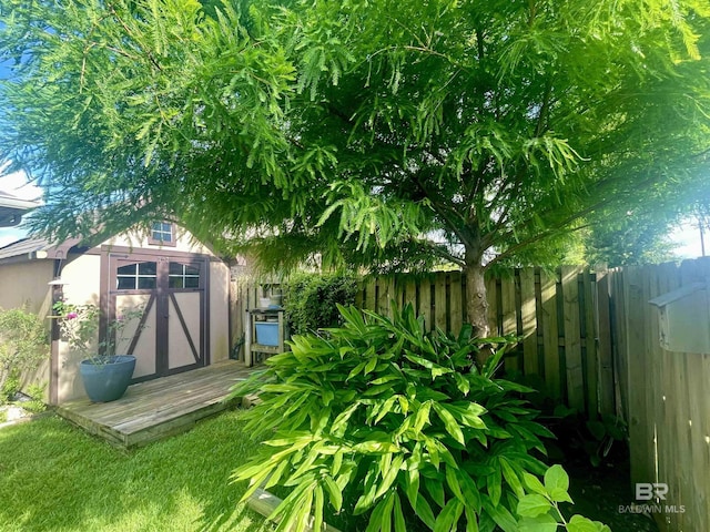 1556 Kairos Loop, Foley, AL 36535 - fenced backyard with a storage unit