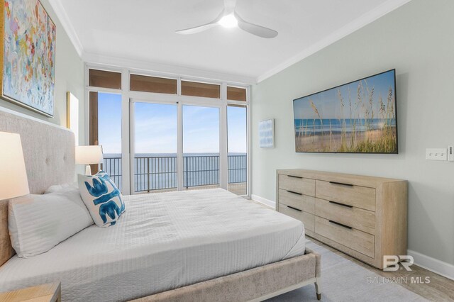 23008 W Perdido Beach Blvd Unit 1905, Orange Beach, AL 36561 - bedroom with crown molding, baseboards, ceiling fan, and access to outside