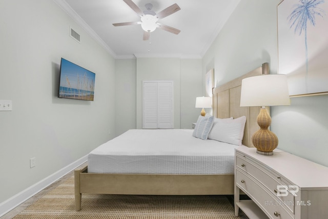 23008 W Perdido Beach Blvd Unit 1905, Orange Beach, AL 36561 - bedroom with ornamental molding, ceiling fan, baseboards, and light colored carpet